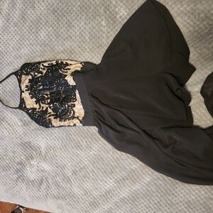 Elegant Black and Cream Halter Dress with Sequins